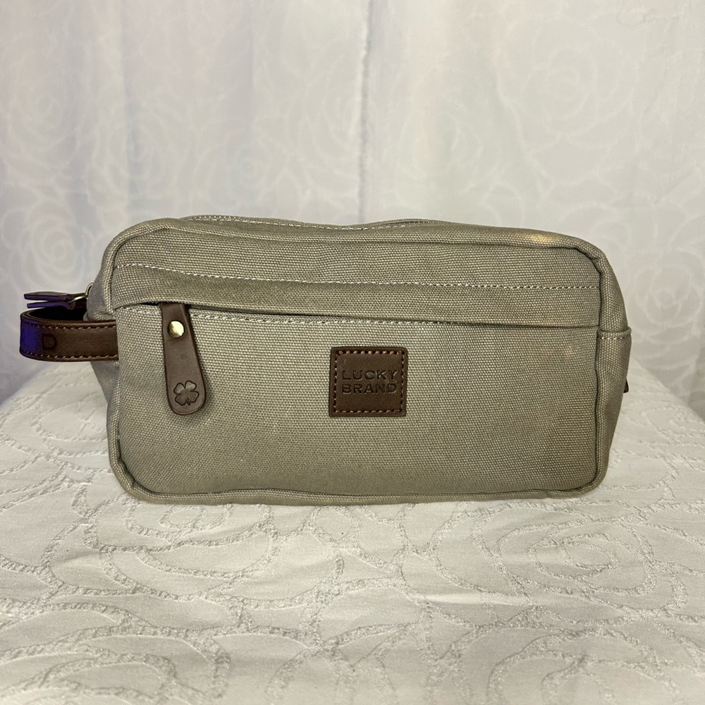Lucky Brand Men’s Beige Khaki colored Canvas Toiletry travel Pouch.